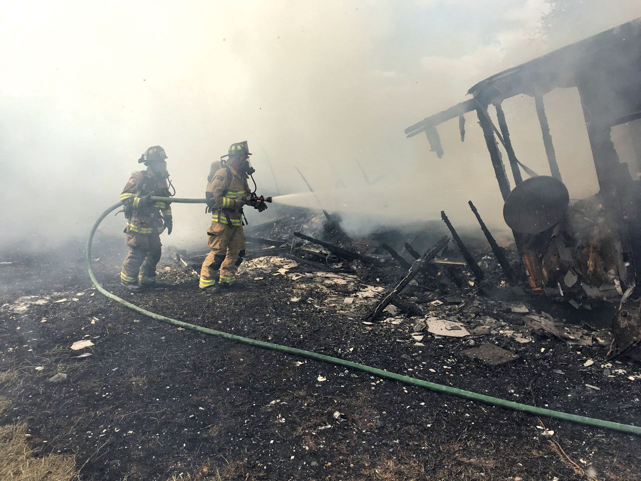 County firefighters battle massive structure fire